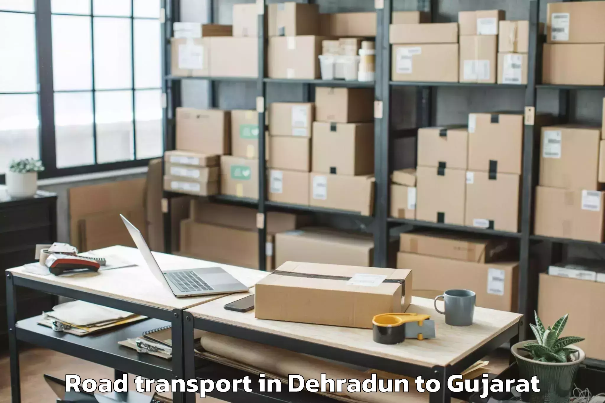 Book Dehradun to Dholera Road Transport Online